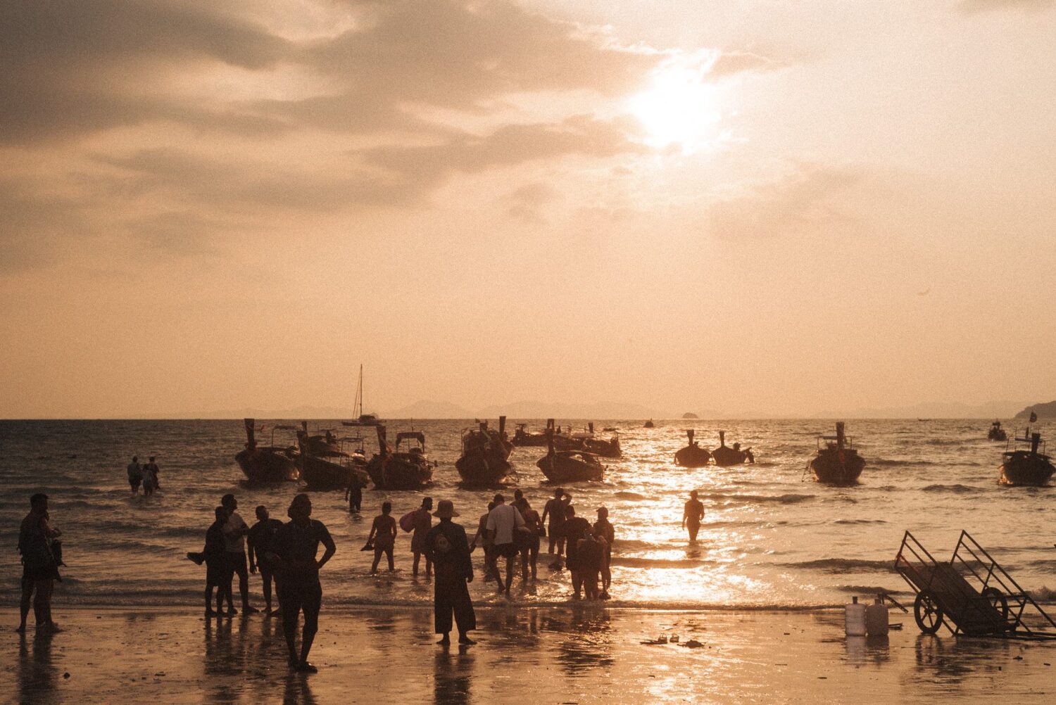 Railay beach at sunset, full of boat taking people back to Krabi, a daily ritual