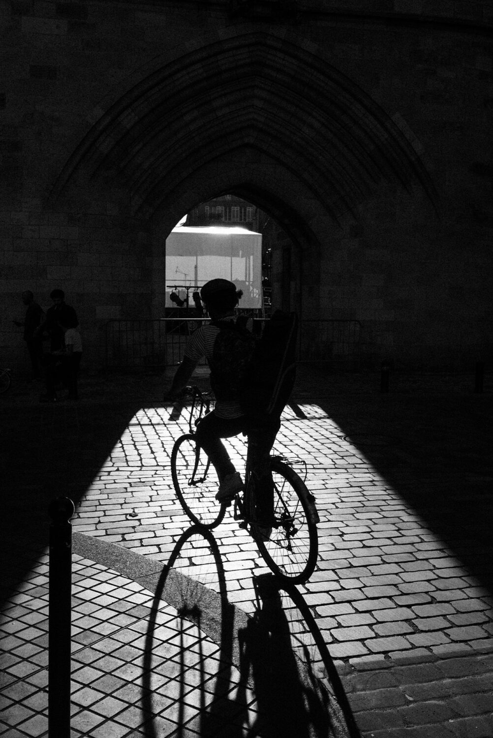 Street-photography-France-09 Silhouette of a cyclist in the city, france