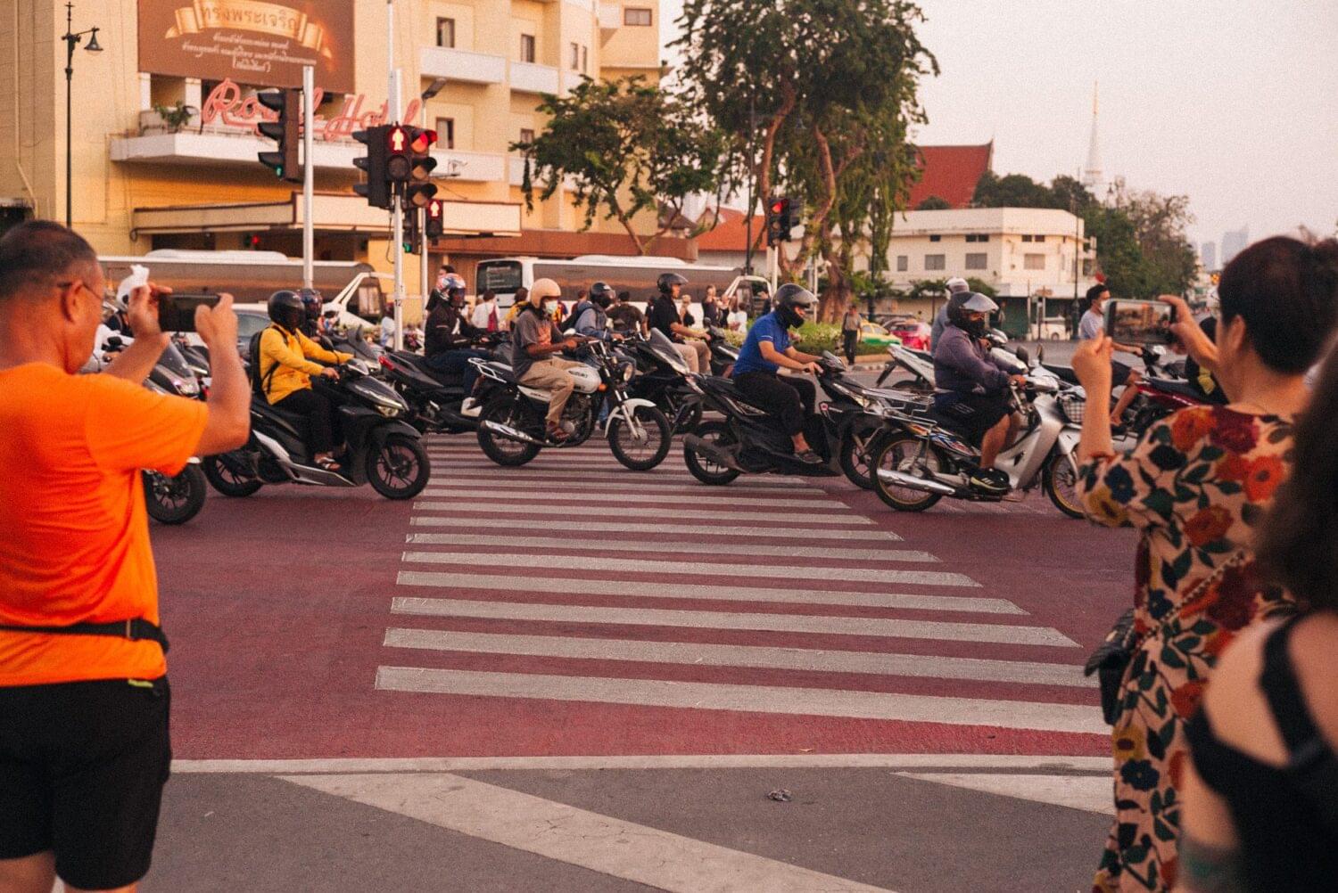Tourist traveler photographer costa rica 24 A crossroad full of motorcyclists passing randomly and with different outfits. And people take pictures.