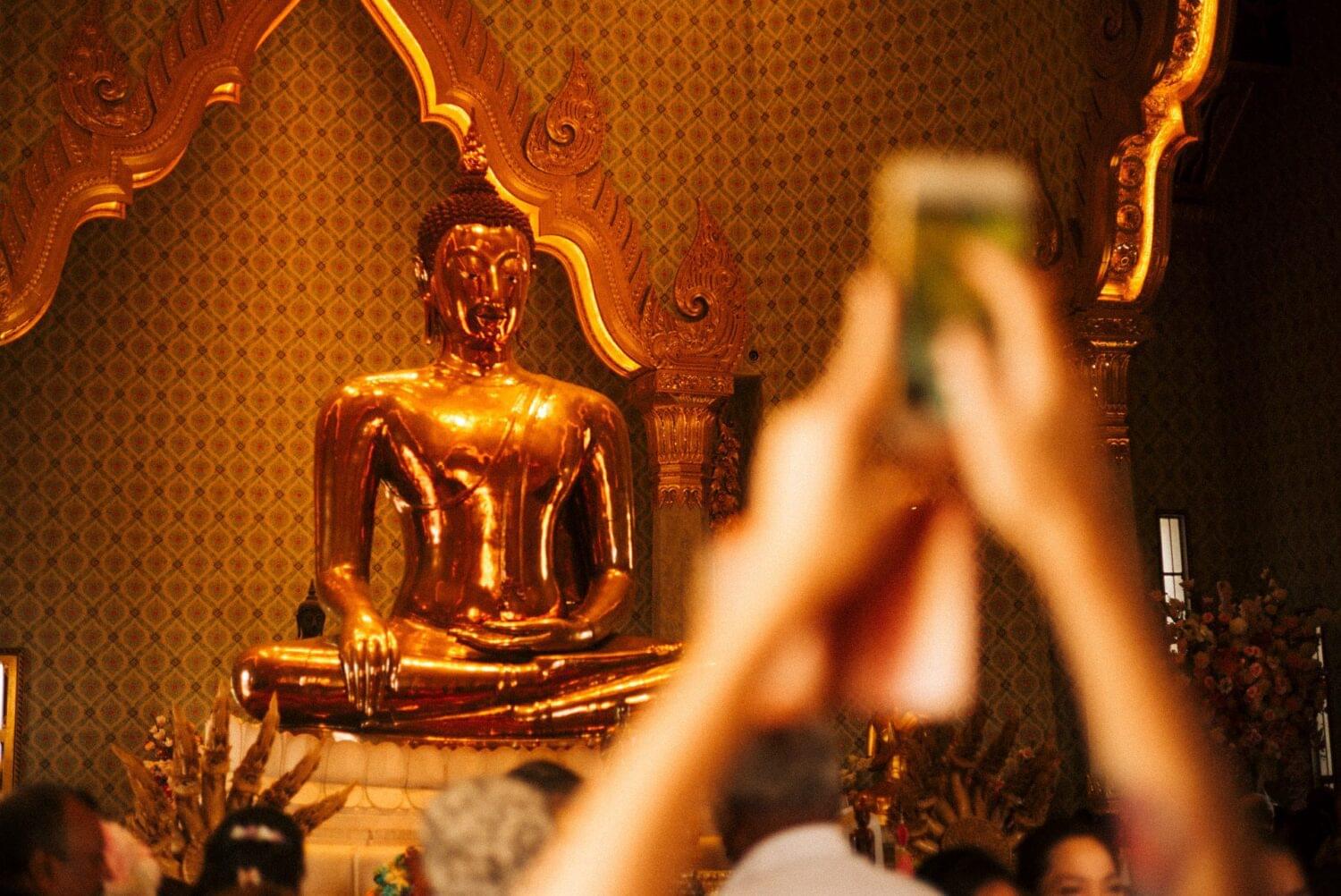 Tourist traveler photographer costa rica 8 The golden Buddha. The origins of this statue are uncertain. The head of the statue is egg-shaped, which indicates its origin in the Sukhothai period in the 13th–14th centuries. At some point in history, the statue was completely plastered over to prevent it from being stolen. Now is seen by thousands of people every day. Photo essays: Thailand