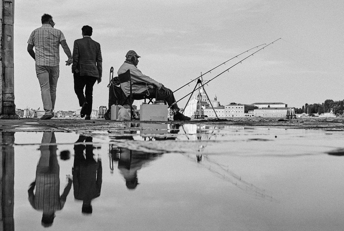 Photography of water reflections on the venice streets